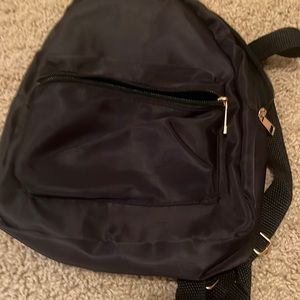 Black mini bag for kids girl or boy gold zippers never been used